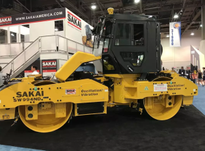 84" Sakai SW994ND asphalt roller with selectable oscillation and vibration in both drums, shown with optional operator cab.