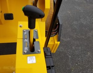 SV414 soil roller operator control lever with forward and reverse plus neutral and green vibration on demand button.
