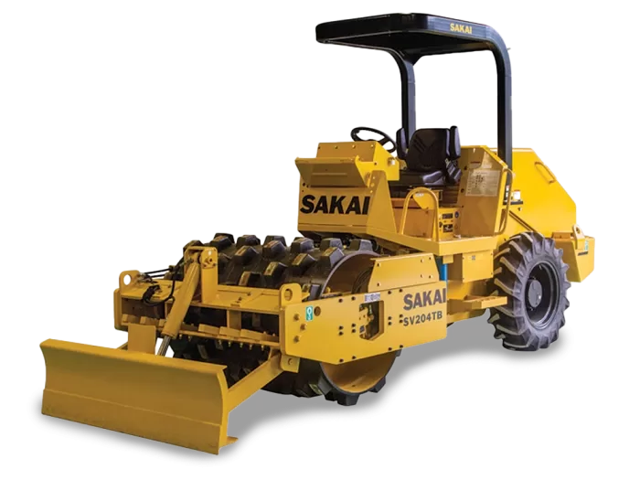 A yellow SAKAI SV204TB 54" 5 ton pad foot soil compactor with leveling or strike off blade kit.