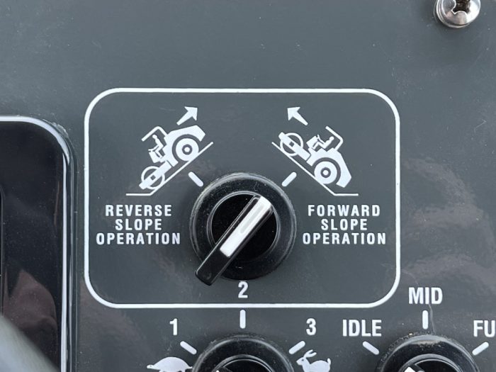 Traction control switch settings for the SV544 soil compactor.