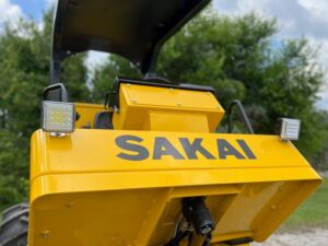 LED work lights accessory mounted to the front of an SV414 soil compactor operator deck.